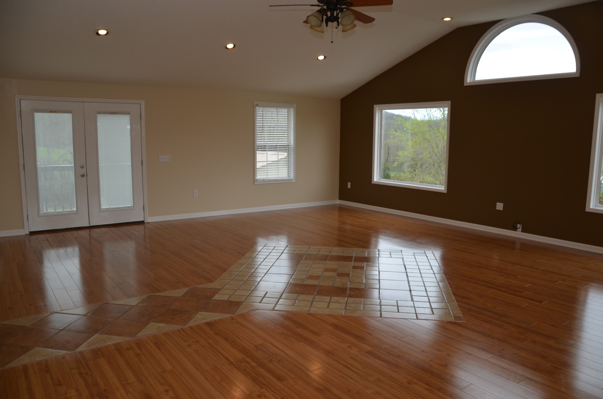 2742 Sherrilltown Road Watertown, TN 37184 - Photo 12 of 30 a view of empty room with wooden floor and fan