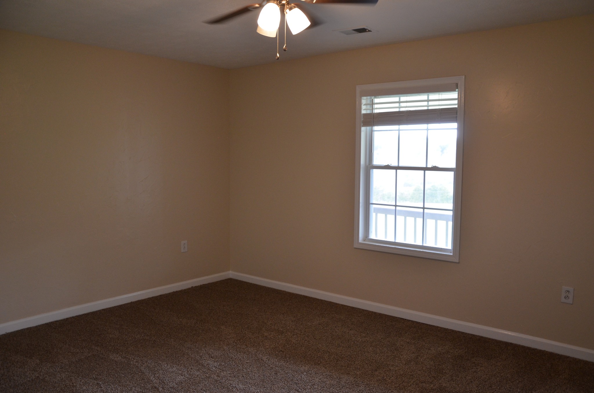2742 Sherrilltown Road Watertown, TN 37184 - Photo 13 of 30 an empty room with a window