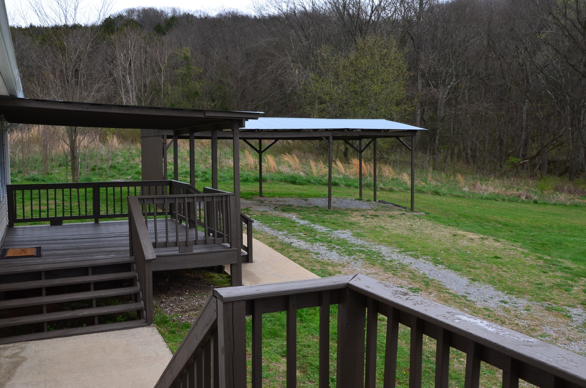 2742 Sherrilltown Road Watertown, TN 37184 - Photo 23 of 30 a view of a deck with a yard