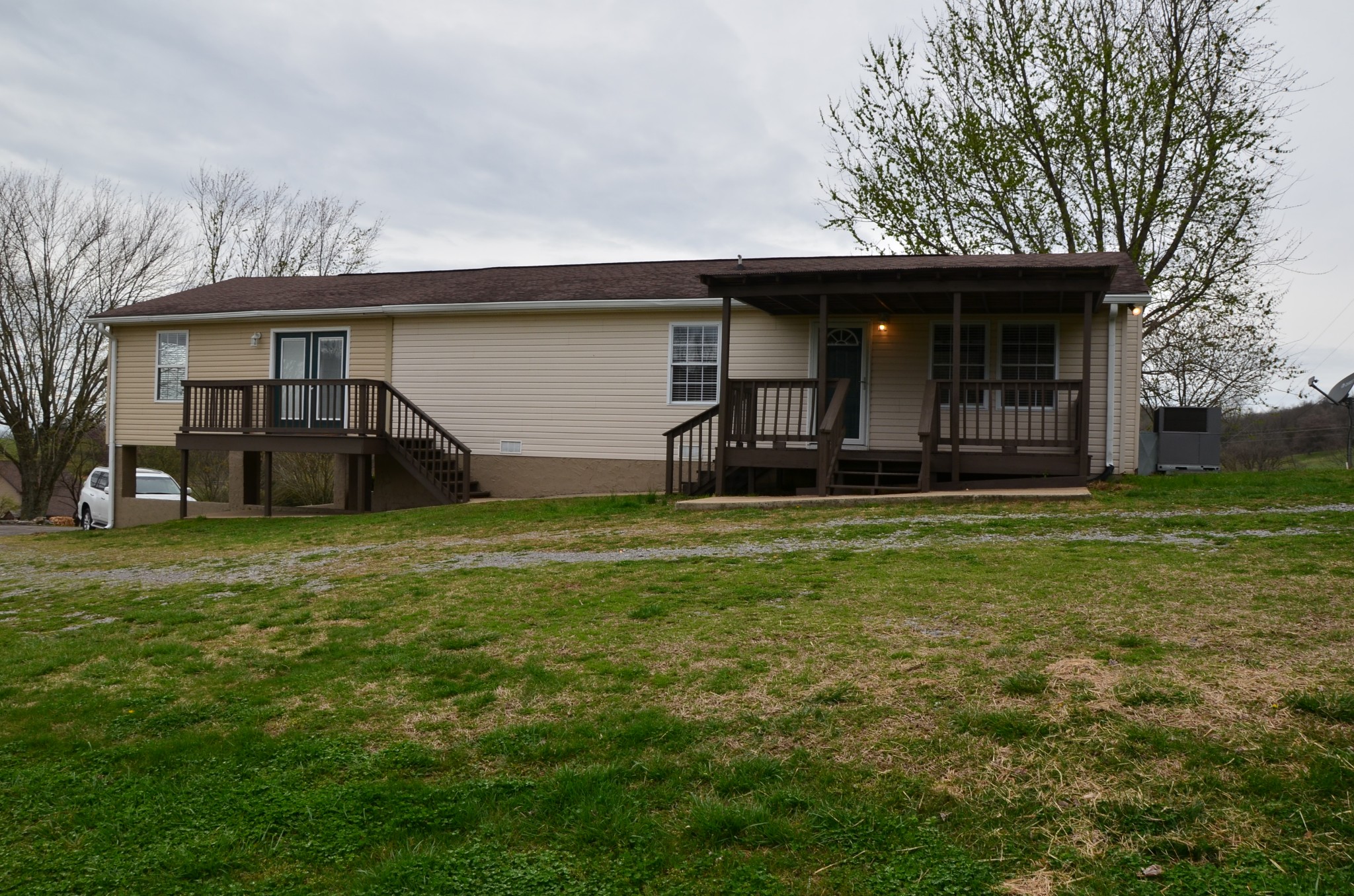 2742 Sherrilltown Road Watertown, TN 37184 - Photo 25 of 30 a front view of a house with a yard
