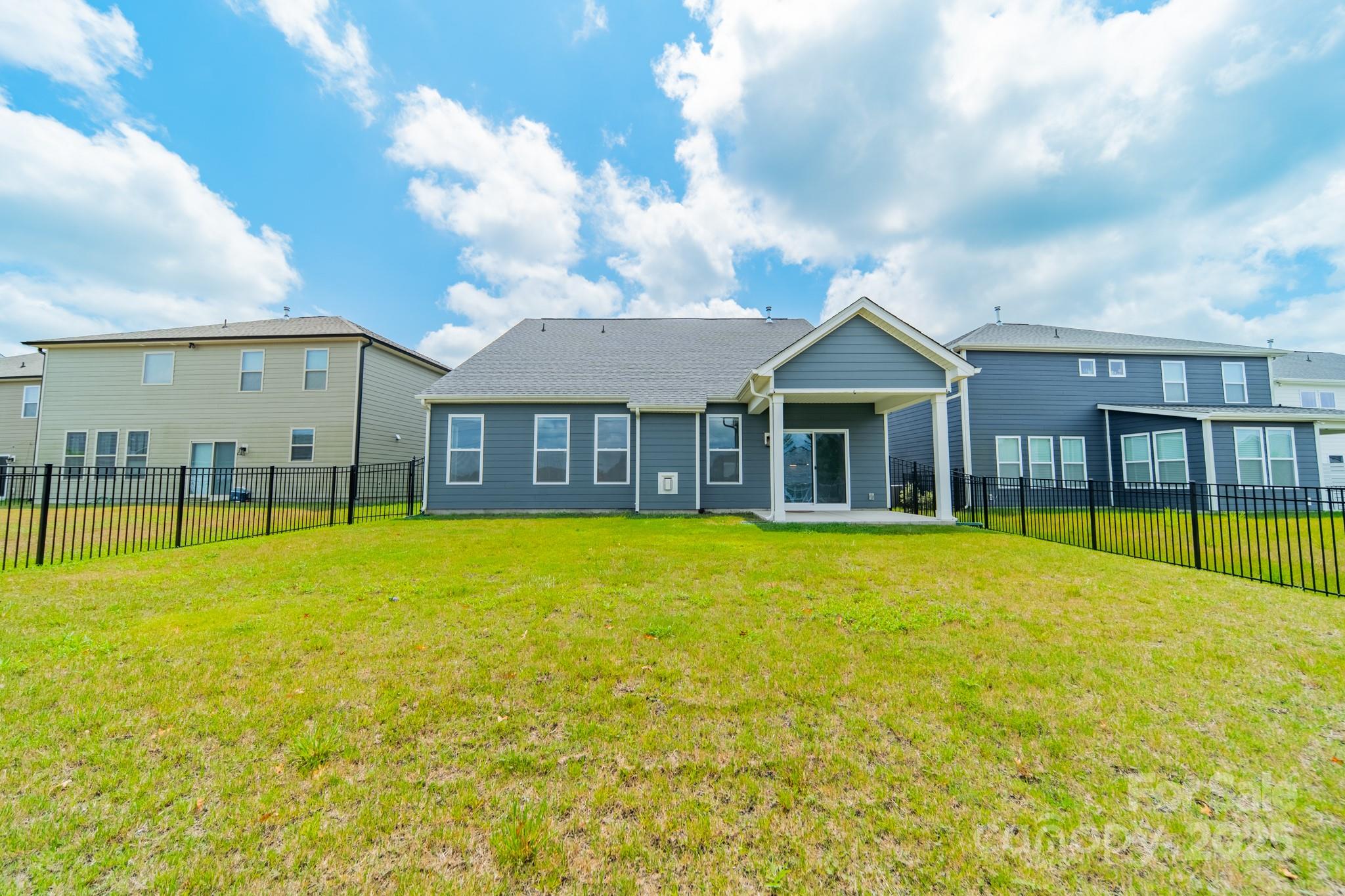 558 Red Wolf Lane Clover, SC 29710 - Photo 17 of 19 a view of a house with swimming pool and porch