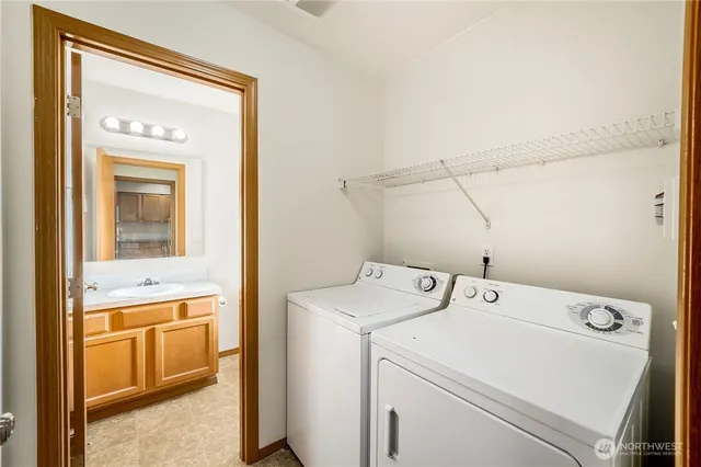 a utility room with dryer and washer