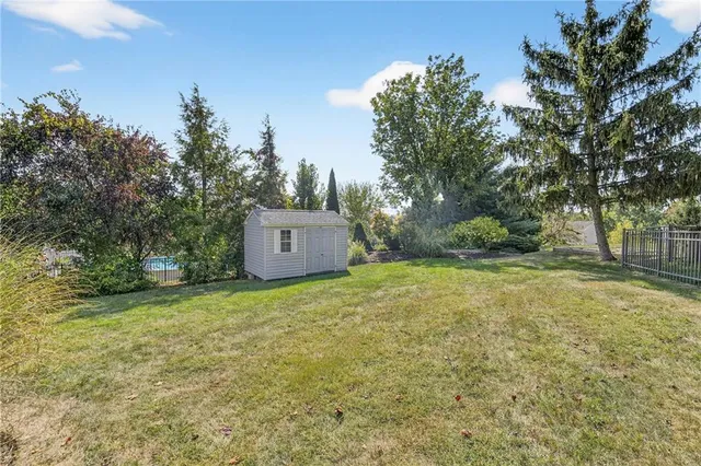 a fire hydrant in the middle of a field