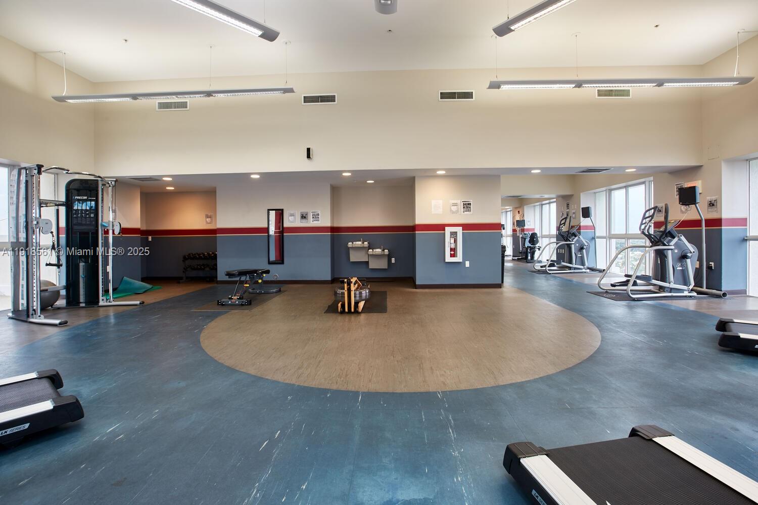 7285 Southwest 90th Street, Unit D613 Miami, FL 33156 - Photo 13 of 20 a living room with furniture and a flat screen tv