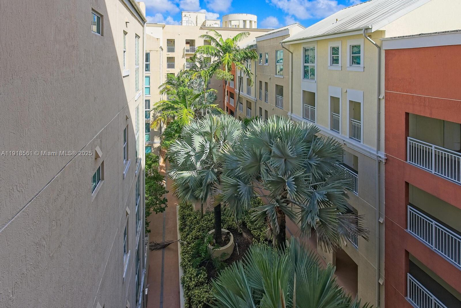 7285 Southwest 90th Street, Unit D613 Miami, FL 33156 - Photo 15 of 20 a plant is in front of building