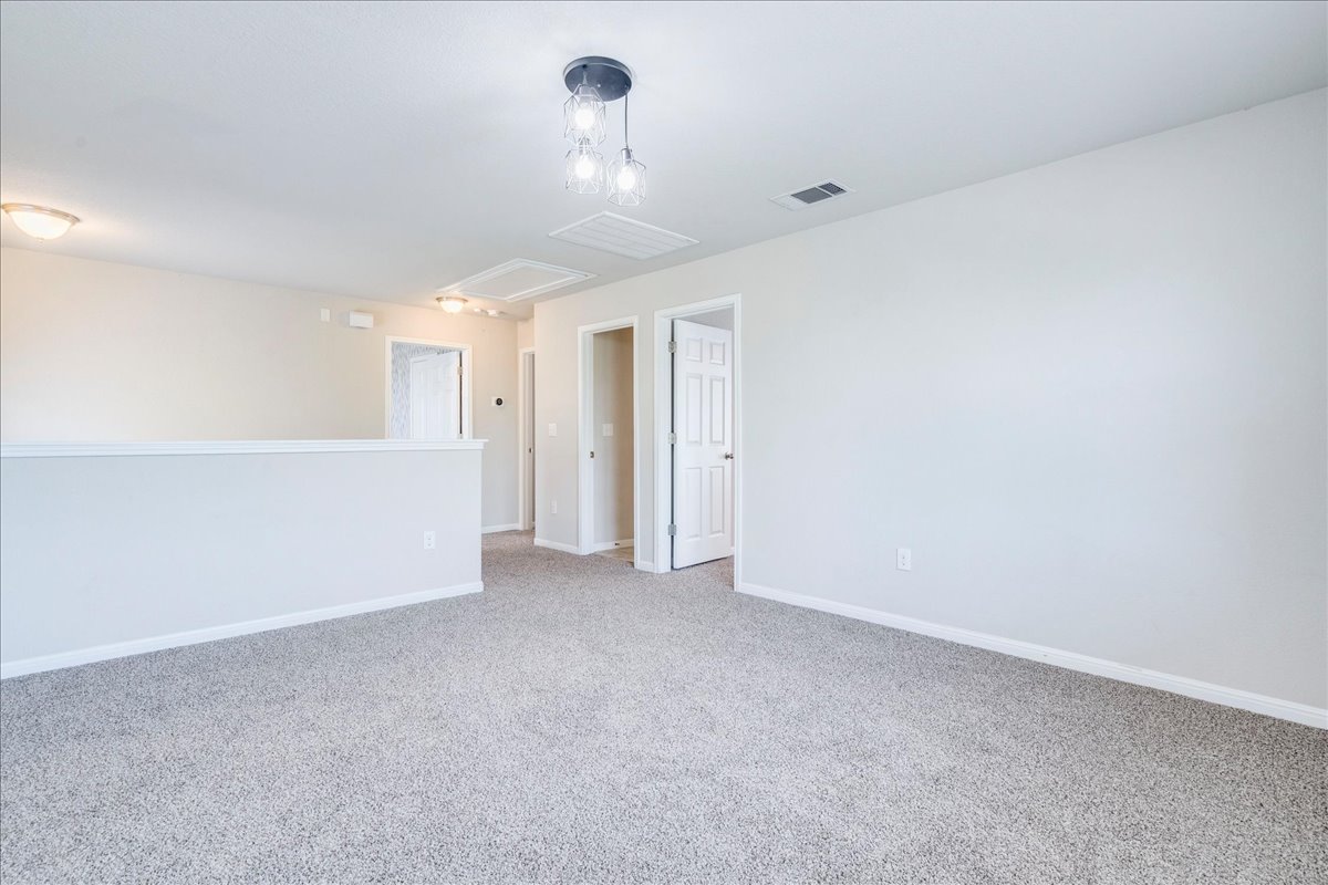 312 Triumph Road Buda, TX 78610 - Photo 21 of 36 a view of an empty room