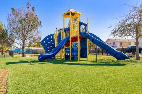 a view of an house with a park