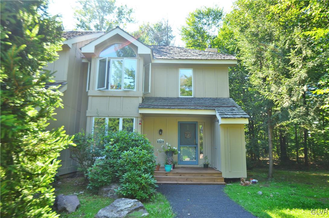 515 Rondaxe Lane Pocono Pines, PA 18350 - Photo 1 of 8 a front view of a house with yard