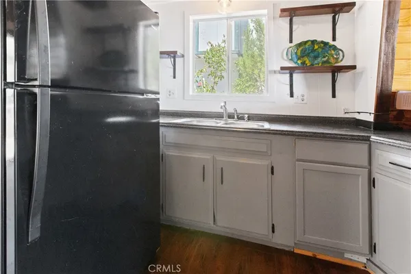 a bathroom with a sink and a window