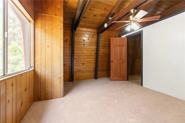 a view of empty room with windows