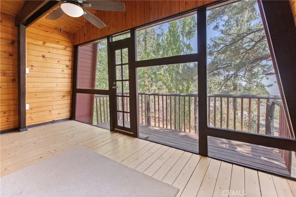 a view of hallway with a large window