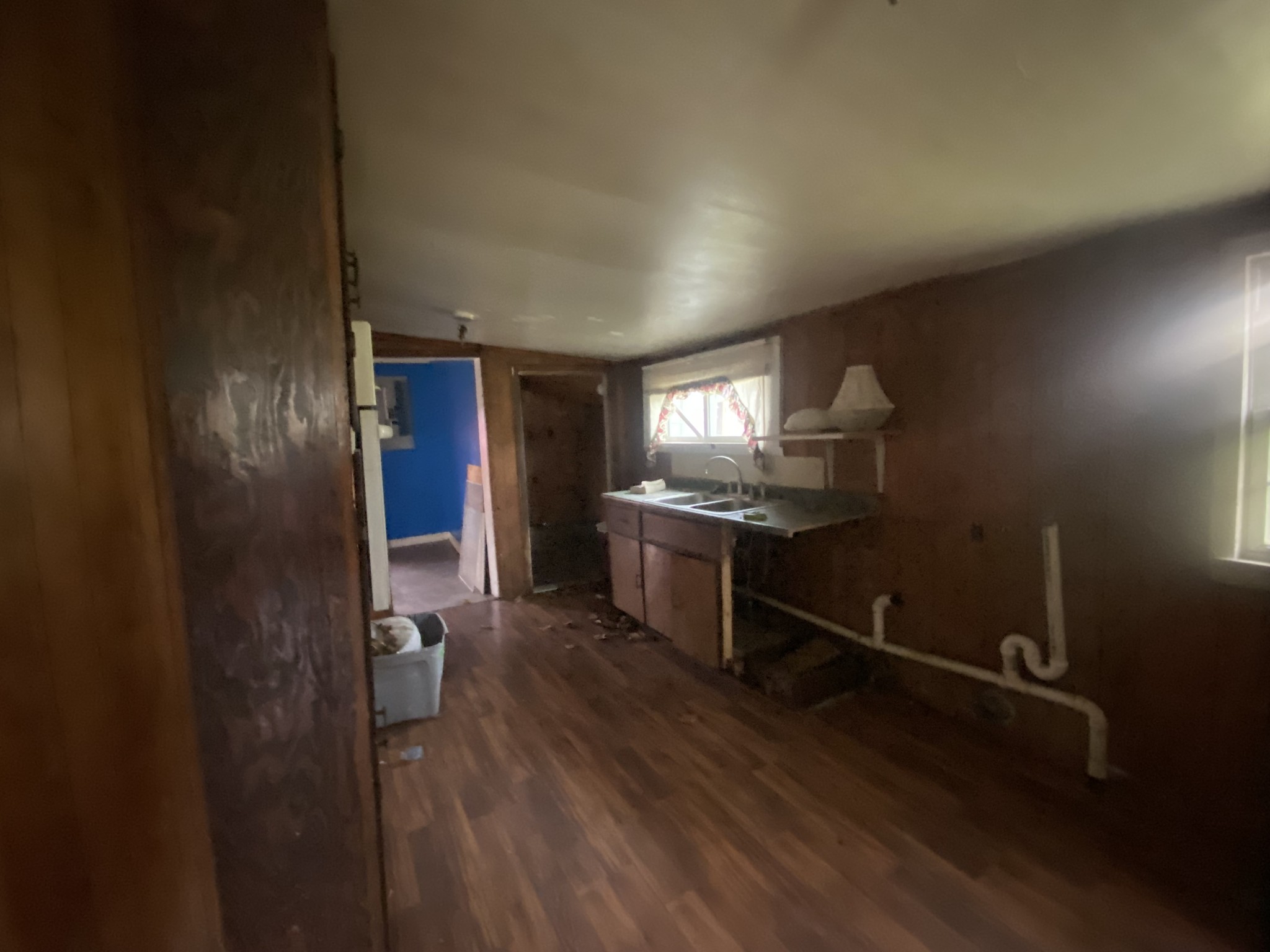 209 Old Morrison Road McMinnville, TN 37110 - Photo 7 of 12 a kitchen with stainless steel appliances kitchen island granite countertop a refrigerator a sink and wooden cabinets