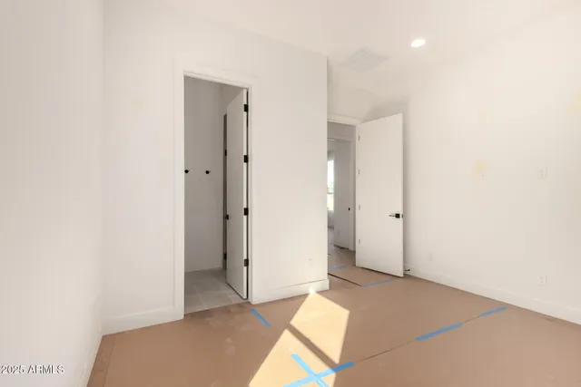 a view of room with a ceiling fan