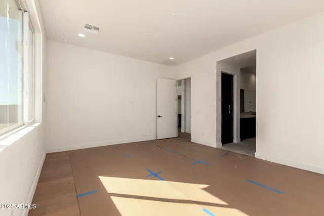 a view of a room with an empty space