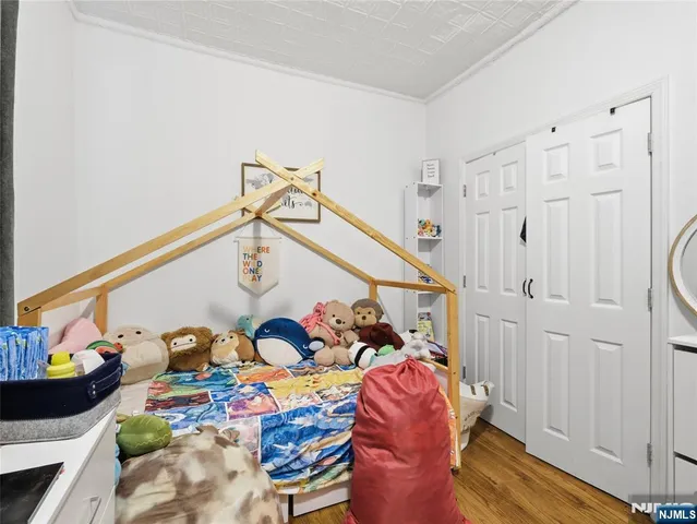 a front view of a house with wooden floor