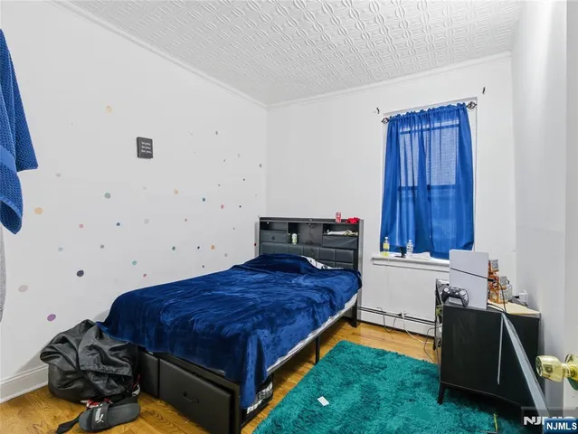 a bed room with a bed and a window