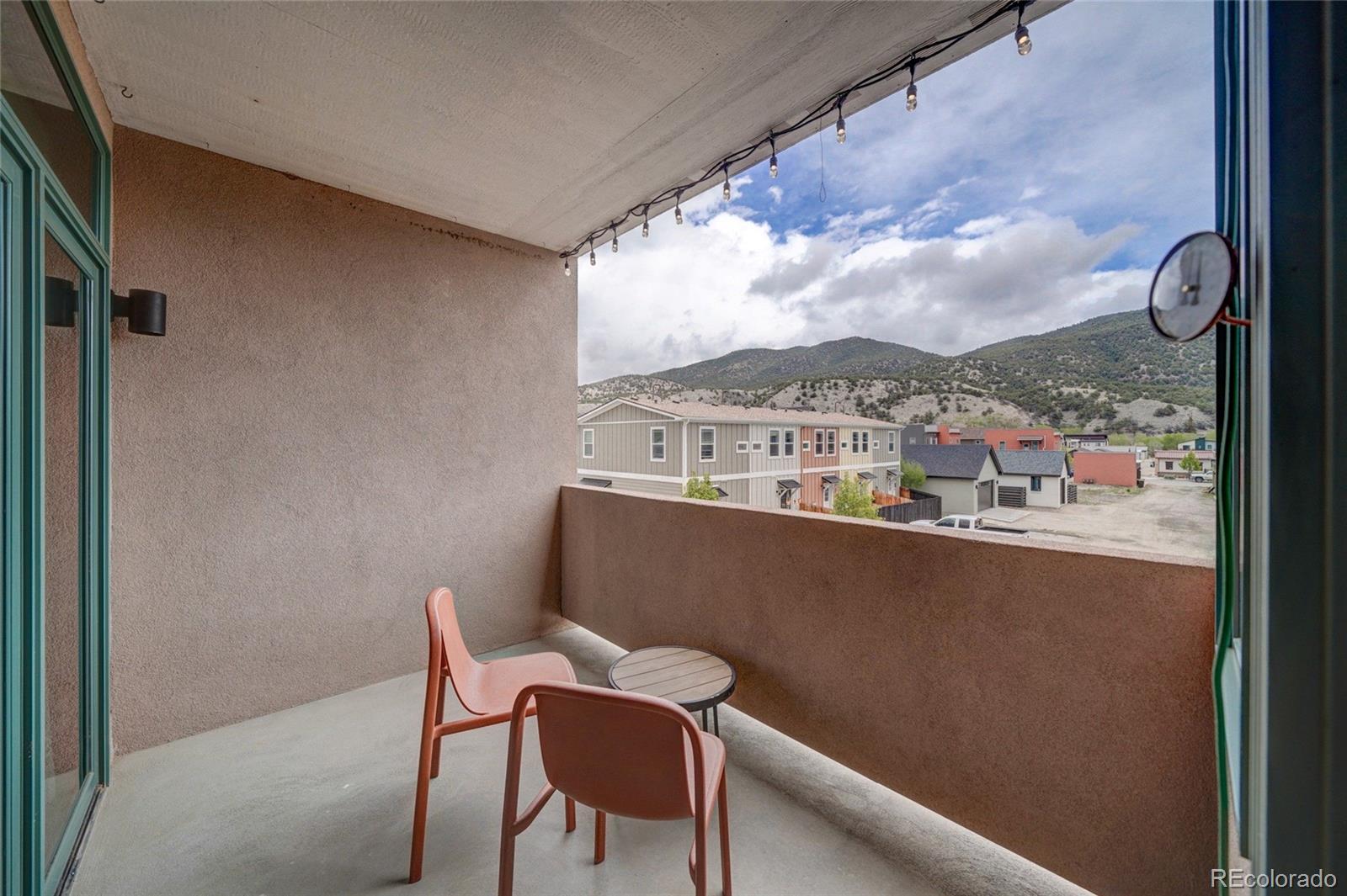 108 Old Stage Road, Unit C Salida, CO 81201 - Photo 15 of 30 a view of a chairs in a balcony