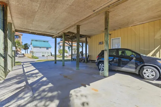 a bedroom with a bed and a table