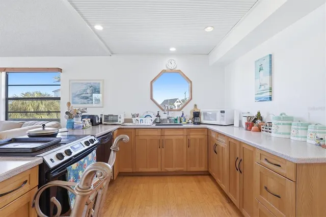 an aerial view of a house with swimming pool