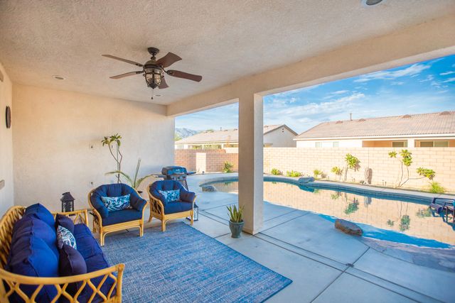 a view of a house with swimming pool