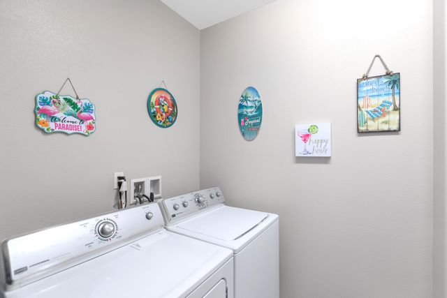 a bathroom with a sink double vanity and a mirror