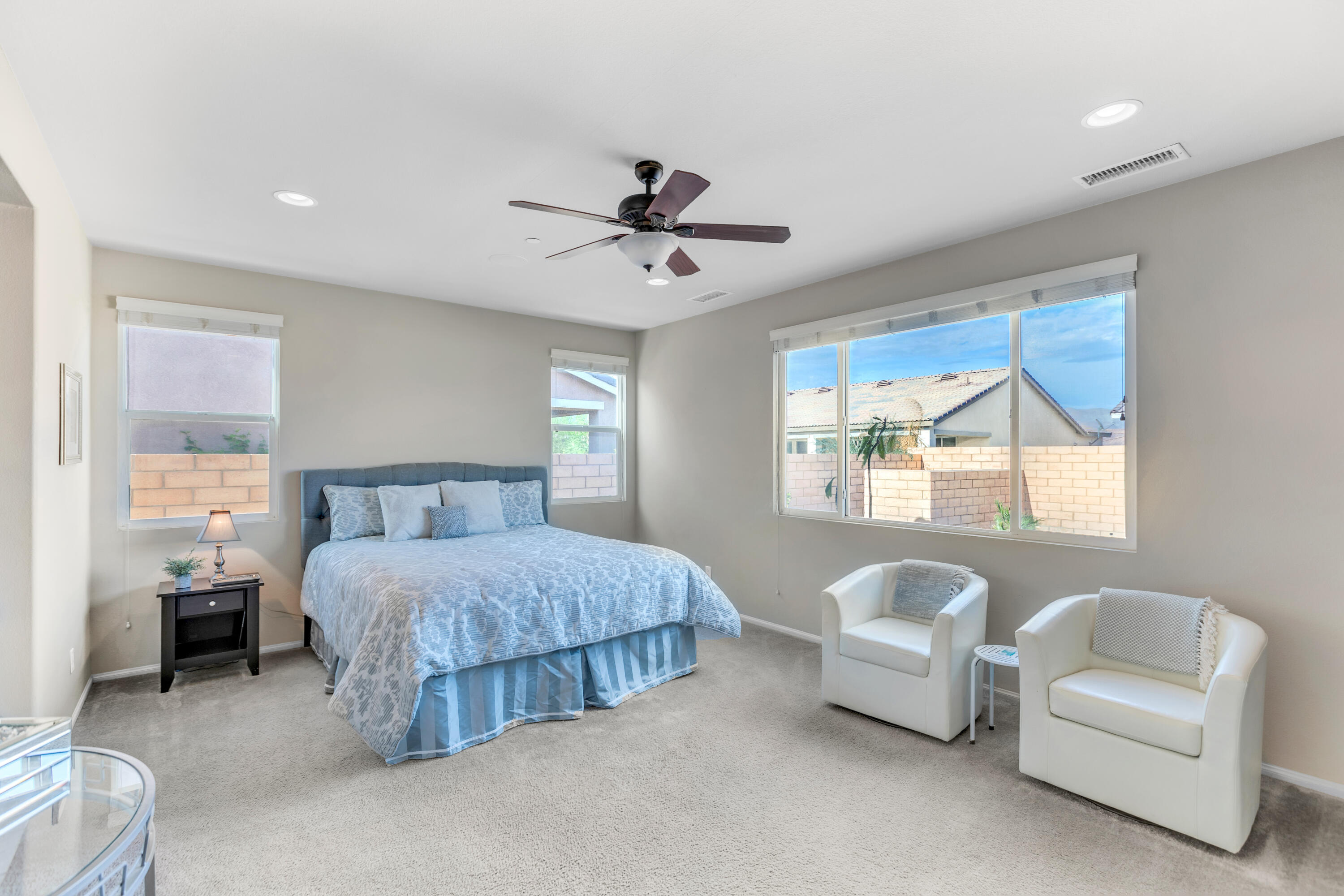 41344 Winfield Court Indio, CA 92203 - Photo 37 of 69 a bedroom with a bed and a couch