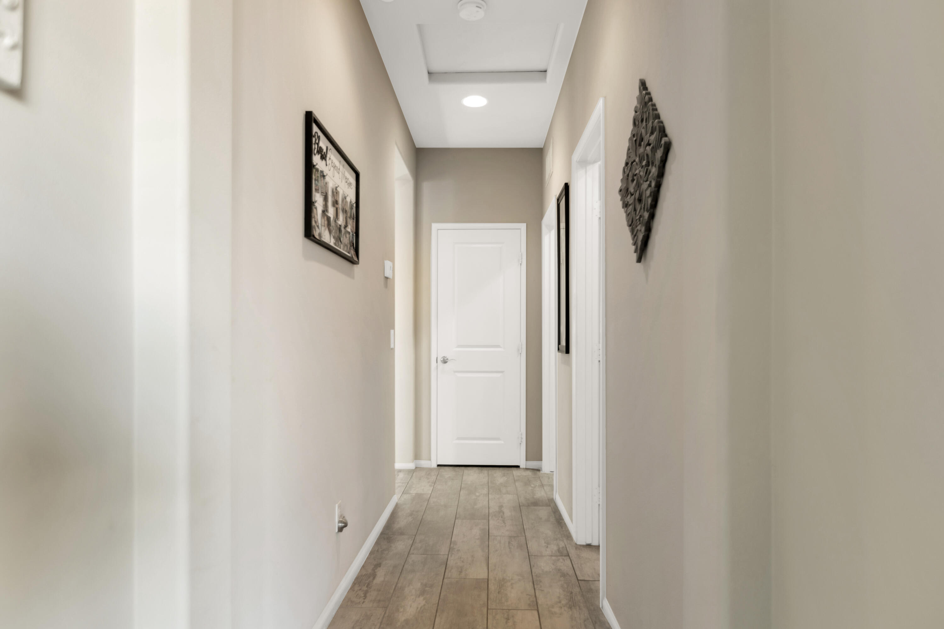 41344 Winfield Court Indio, CA 92203 - Photo 44 of 69 a view of a hallway with wooden floor