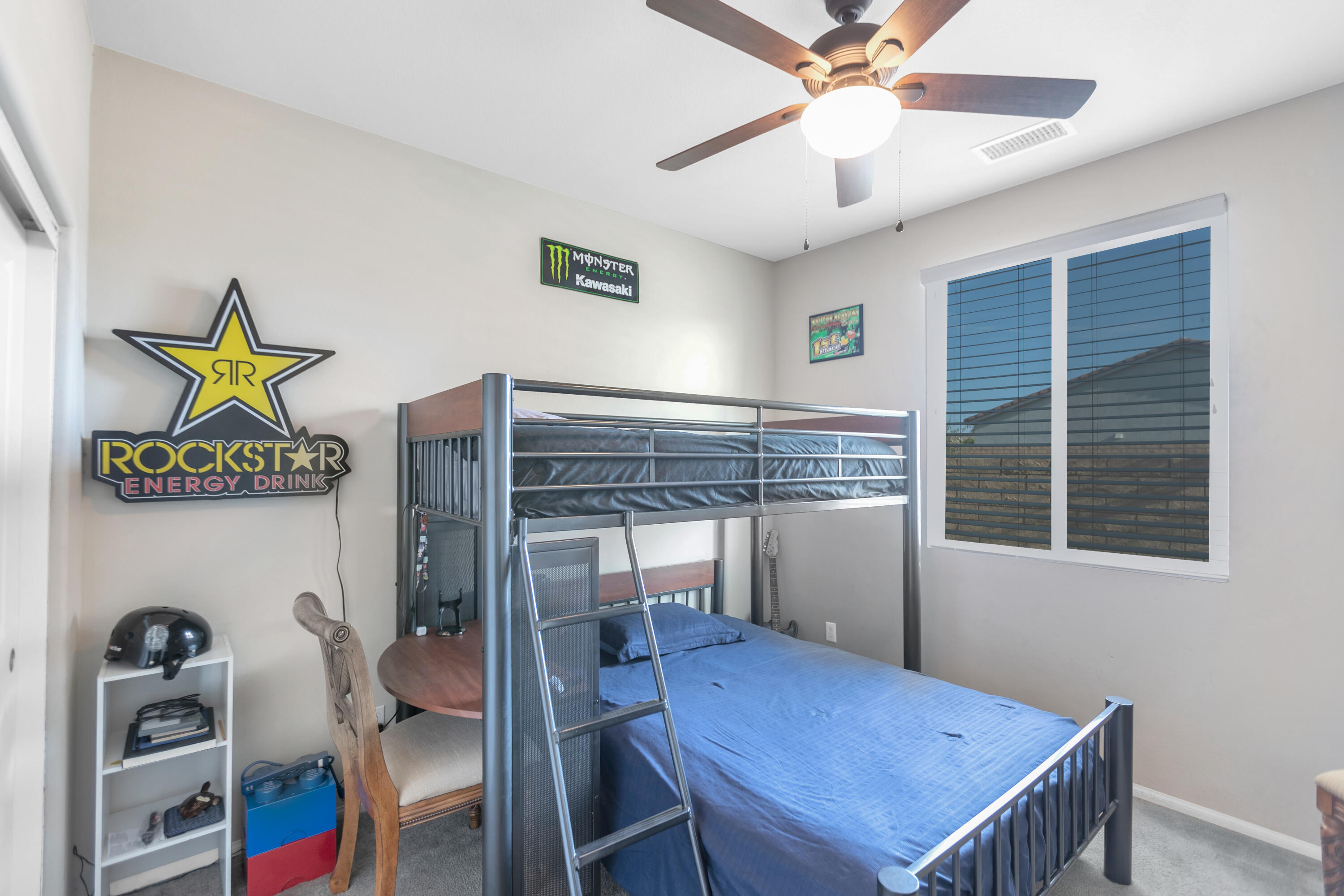 41344 Winfield Court Indio, CA 92203 - Photo 49 of 69 a view of a dining room with furniture and chandelier