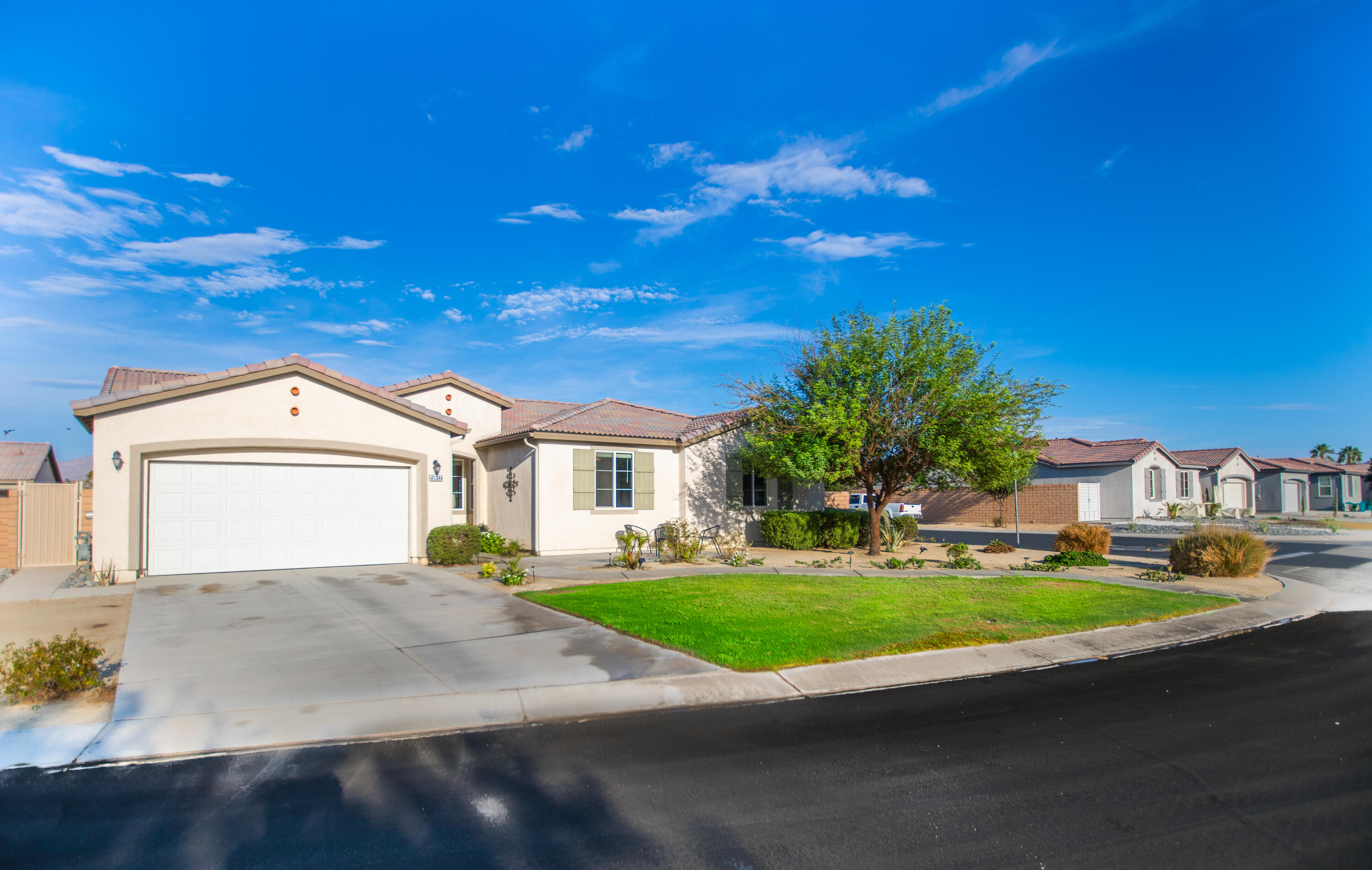 41344 Winfield Court Indio, CA 92203 - Photo 61 of 69 a front view of a house with a yard