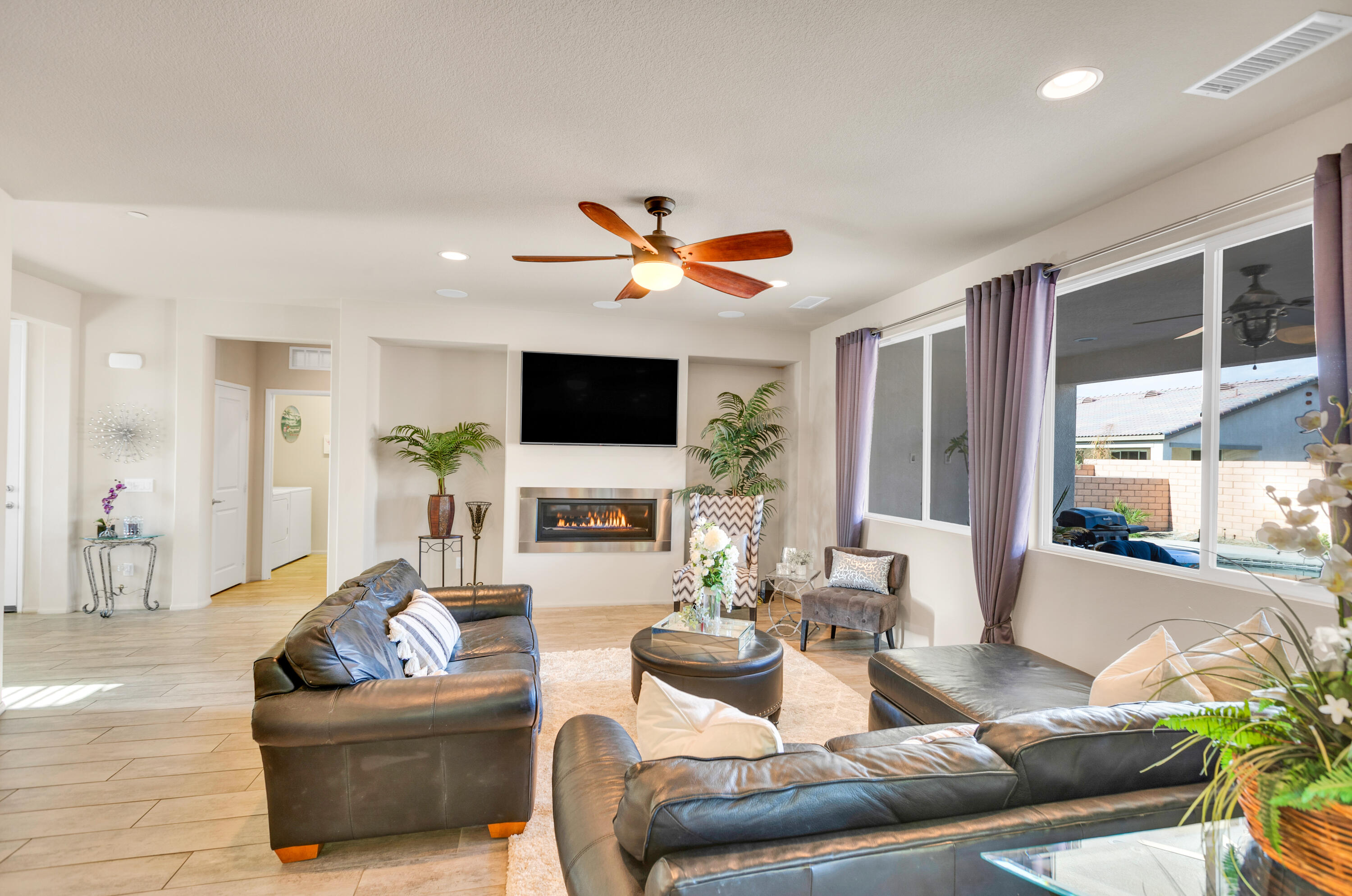 41344 Winfield Court Indio, CA 92203 - Photo 8 of 69 a living room with furniture and a flat screen tv