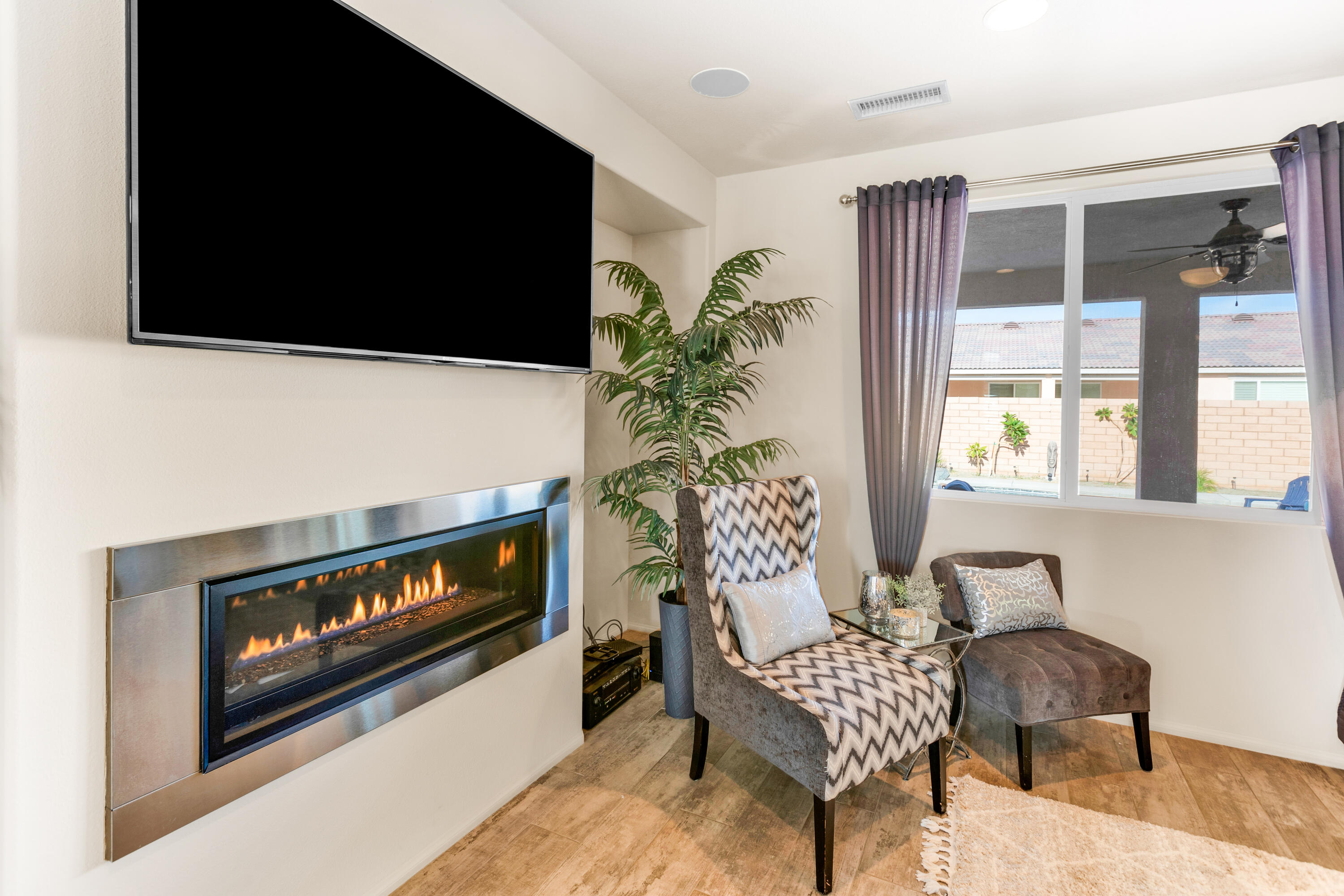 41344 Winfield Court Indio, CA 92203 - Photo 9 of 69 a living room with furniture and a flat screen tv