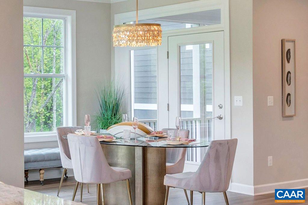 3264 Thicket Run Drive Charlottesville, VA 22911 - Photo 11 of 25 a view of a dining room with furniture window and outside view