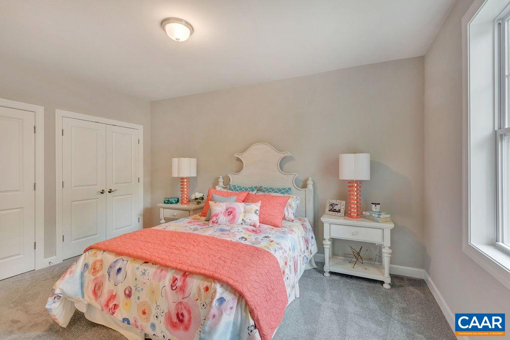 3264 Thicket Run Drive Charlottesville, VA 22911 - Photo 21 of 25 a bedroom with a bed and a window