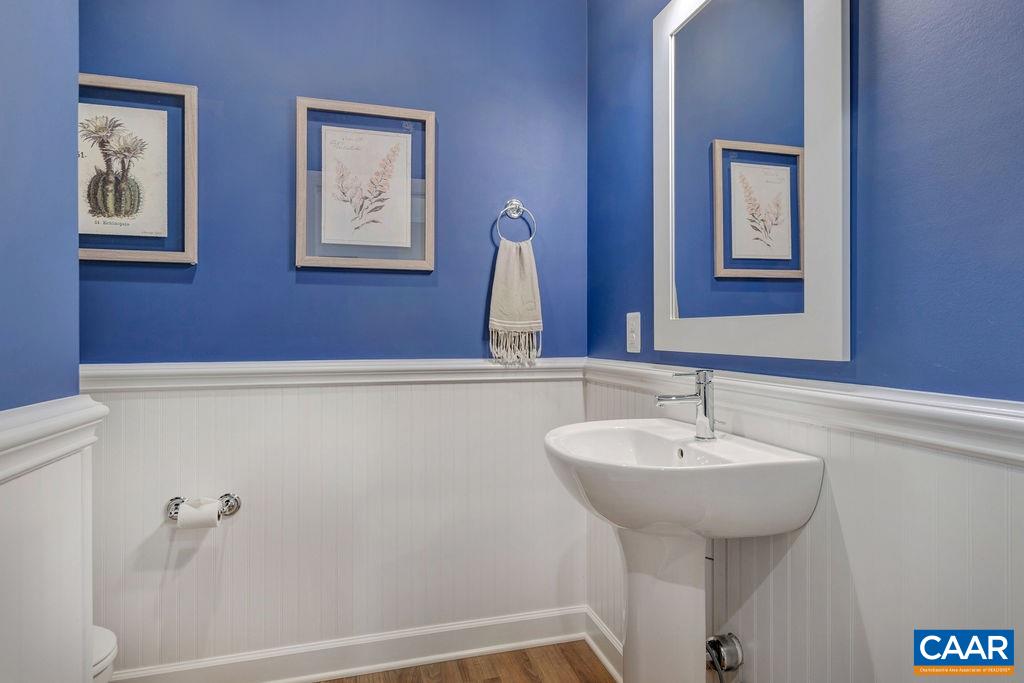 3264 Thicket Run Drive Charlottesville, VA 22911 - Photo 5 of 25 a bathroom with a sink and a mirror