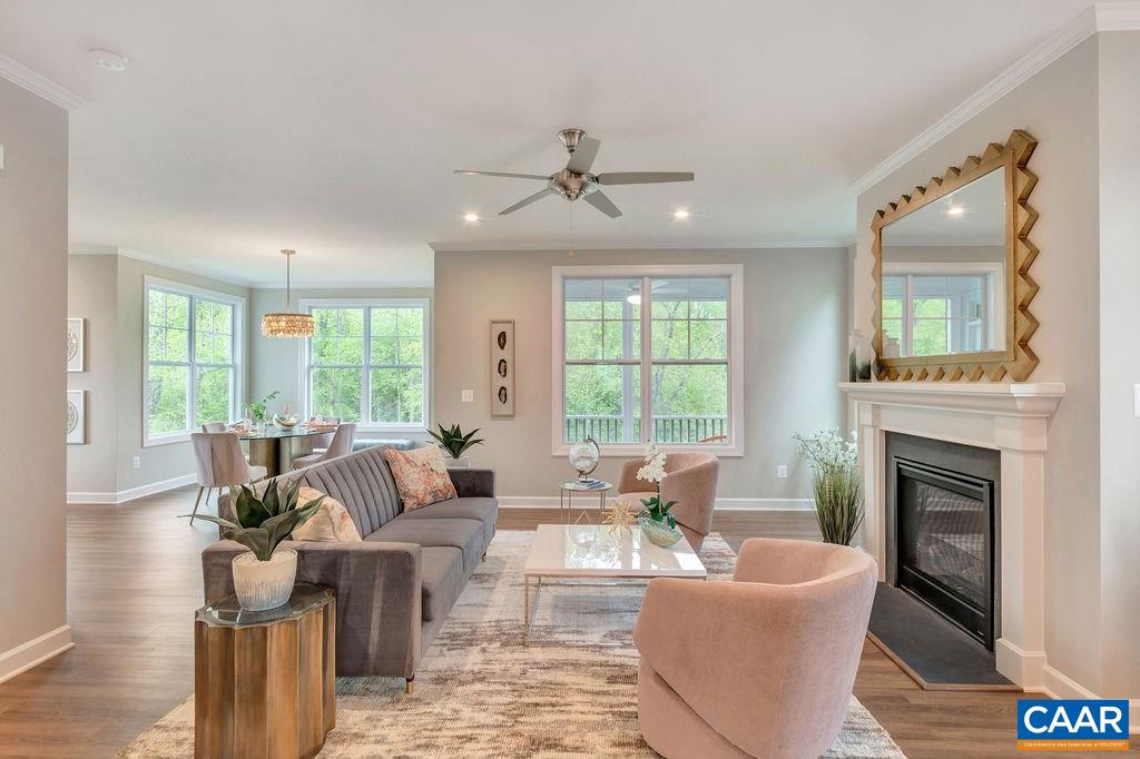 3264 Thicket Run Drive Charlottesville, VA 22911 - Photo 6 of 25 a living room with furniture large window and fireplace