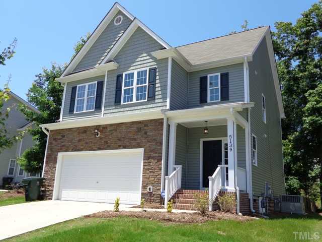 front view of house with a yard