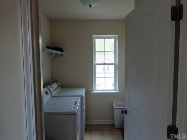 5139 Arbor Chase Drive Raleigh, NC 27616 - Photo 16 of 25 a storage room with a window