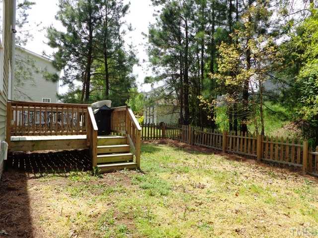 5139 Arbor Chase Drive Raleigh, NC 27616 - Photo 23 of 25 a view of a deck with a yard