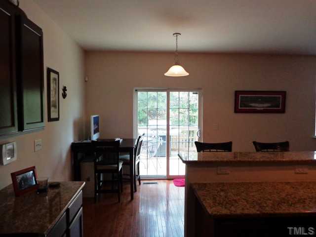 5139 Arbor Chase Drive Raleigh, NC 27616 - Photo 6 of 25 a living room with furniture and wooden floor