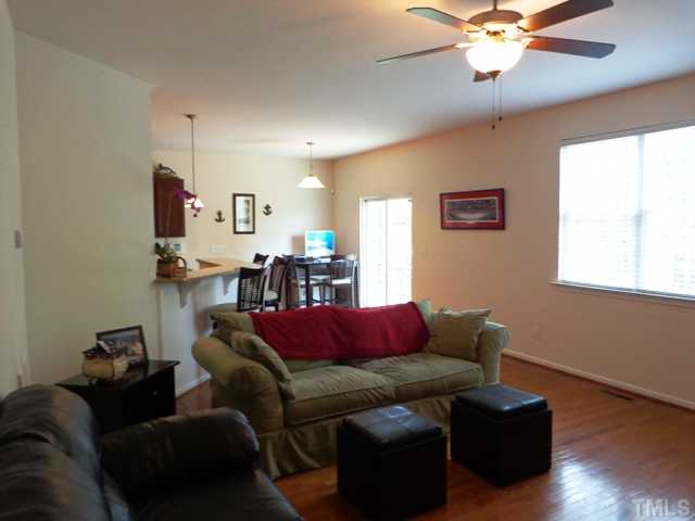 5139 Arbor Chase Drive Raleigh, NC 27616 - Photo 10 of 25 a living room with furniture and a ceiling fan