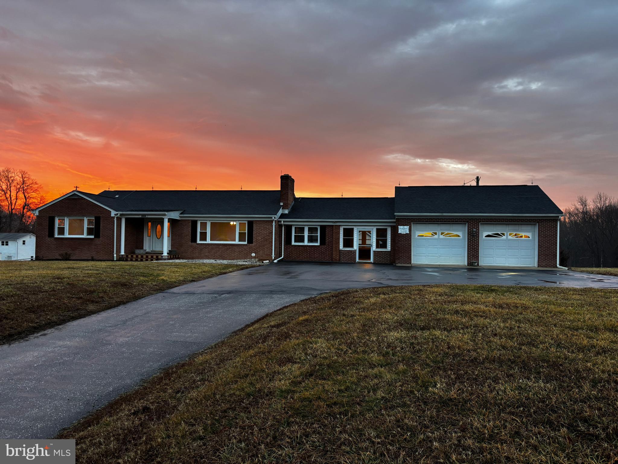 23230 Colton Point Road Avenue, MD 20609 - Photo 2 of 44 a front view of a house with garden