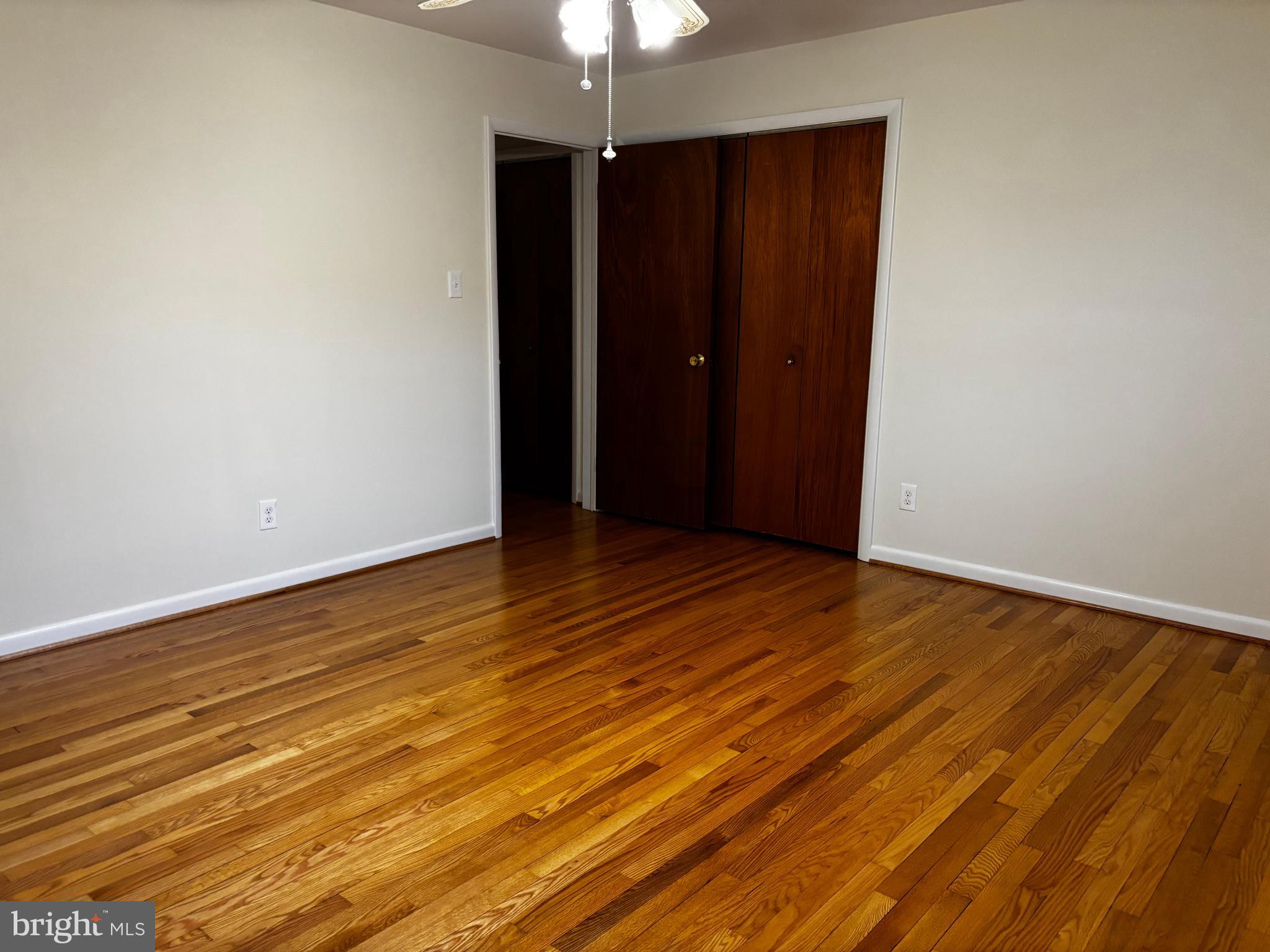 23230 Colton Point Road Avenue, MD 20609 - Photo 23 of 44 wooden floor in an empty room