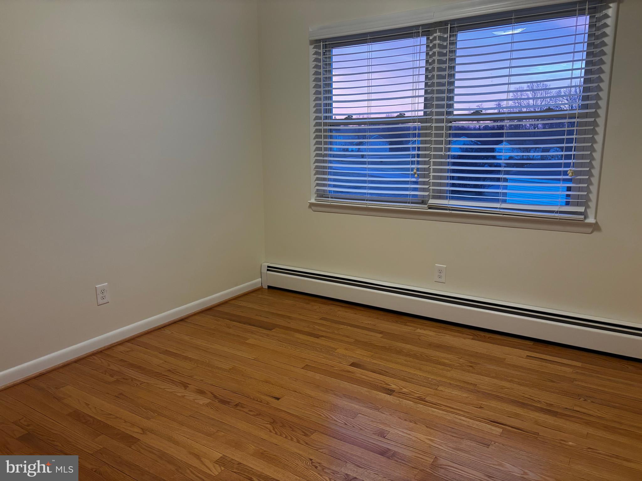 23230 Colton Point Road Avenue, MD 20609 - Photo 29 of 44 a view of a room with wooden floor and a window