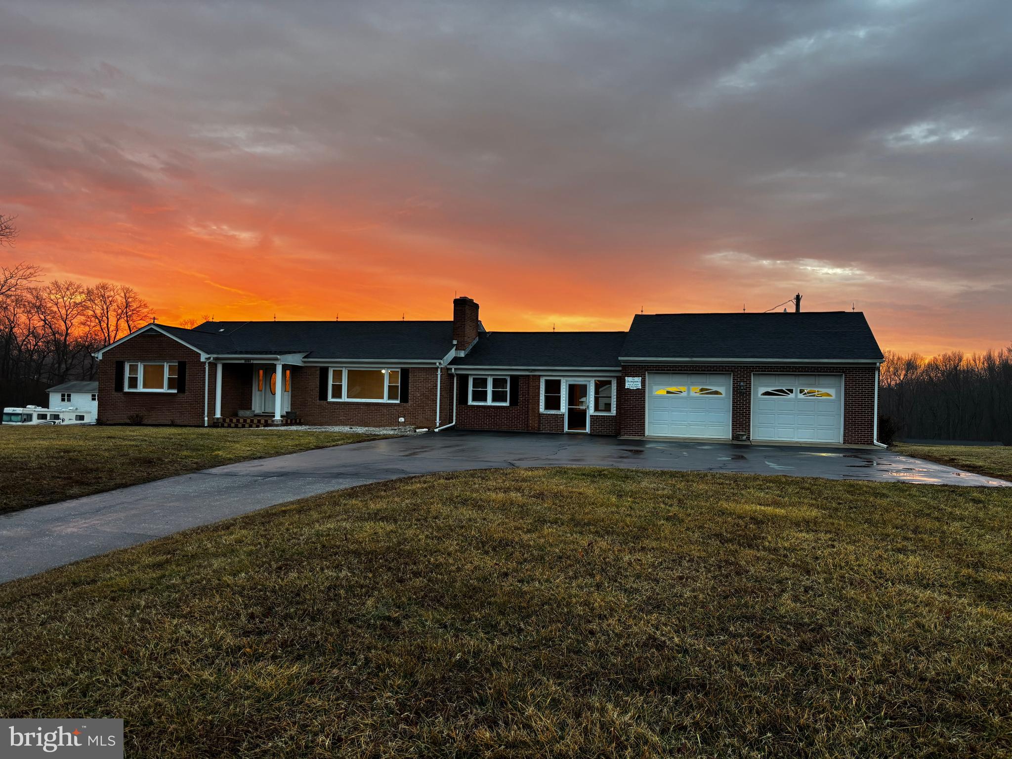 23230 Colton Point Road Avenue, MD 20609 - Photo 3 of 44 a front view of a house with garden
