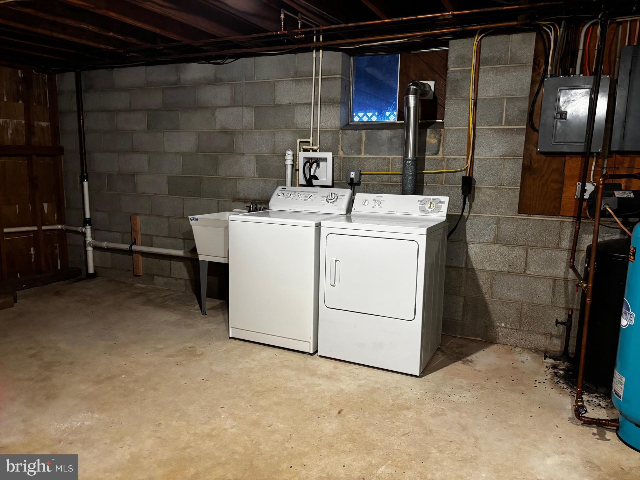 23230 Colton Point Road Avenue, MD 20609 - Photo 31 of 44 a room with storage and utility