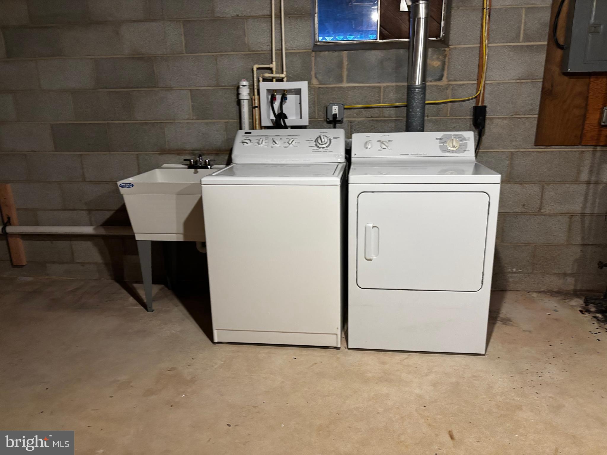 23230 Colton Point Road Avenue, MD 20609 - Photo 32 of 44 a utility room with dryer and washer