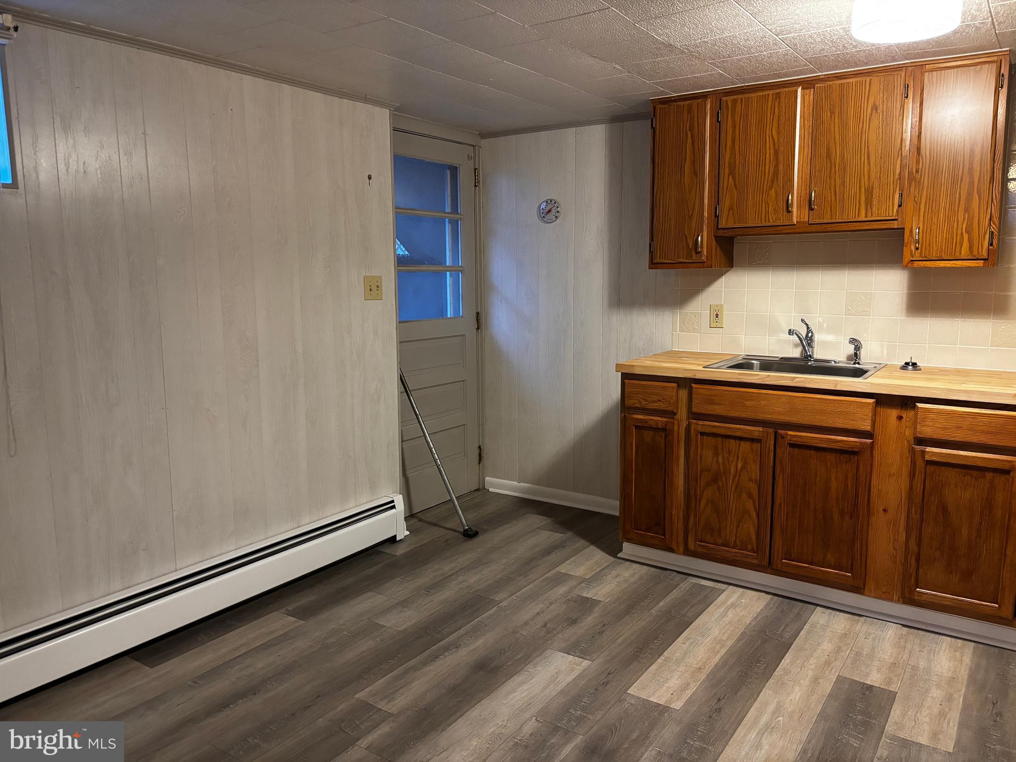 23230 Colton Point Road Avenue, MD 20609 - Photo 36 of 44 a kitchen with stainless steel appliances granite countertop a refrigerator and a sink