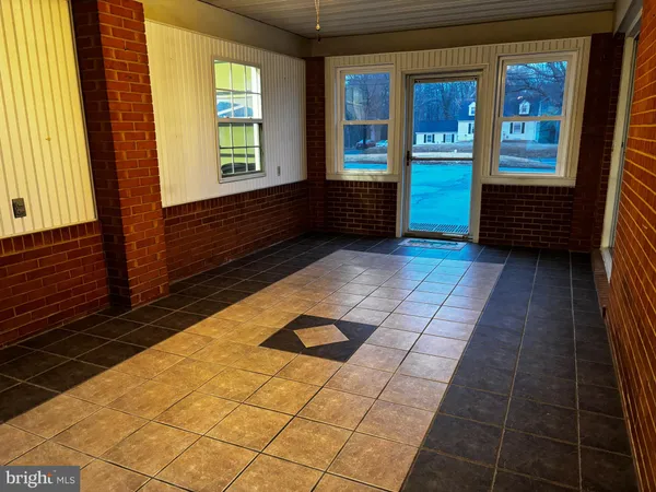 a view of entryway with a front door