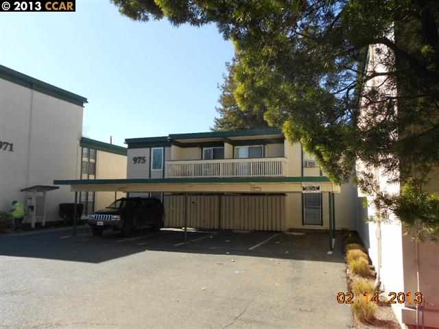 975 Bancroft Road, Unit 102 Concord, CA 94518 - Photo 1 of 1 a front view of a house with a yard