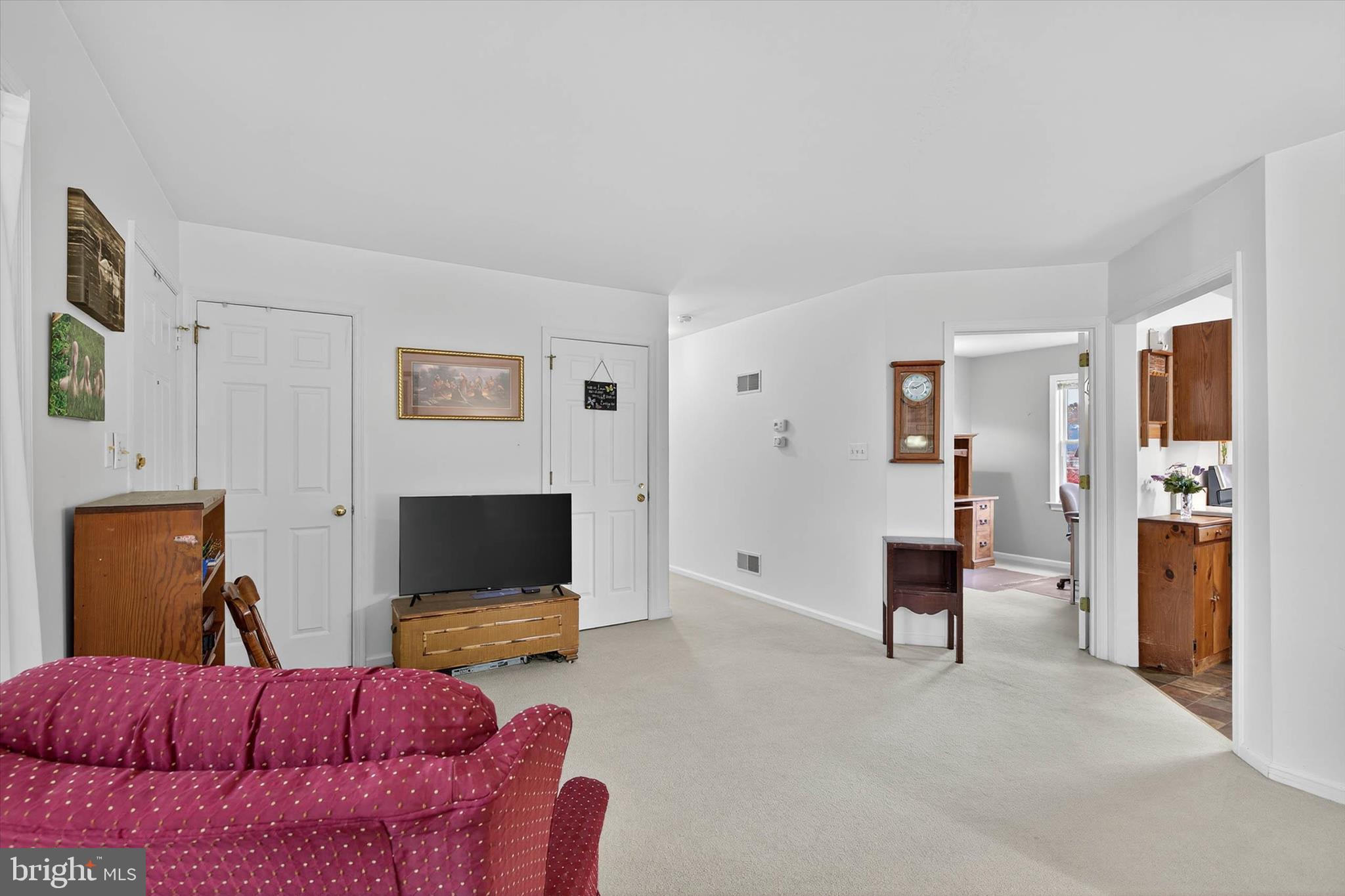 213 East 6th Street Lititz, PA 17543 - Photo 11 of 46 a living room with furniture and a flat screen tv